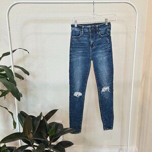 AMERICAN EAGLE SIZE 0 DARK WASH RIPPED SKINNY JEANS, BARELY WORN